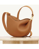 Toscana cross body bag in smooth brown leather with curved design and adjustable strap