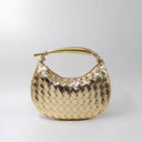 Gold woven handbag with leather design and gold-tone stainless steel handle